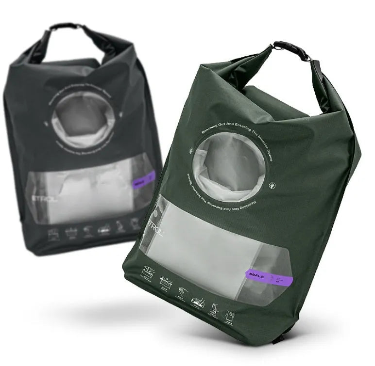 Multi functional portable travel laundry bag in 70D Nylon TPU, folded flat on a table showing its compact size