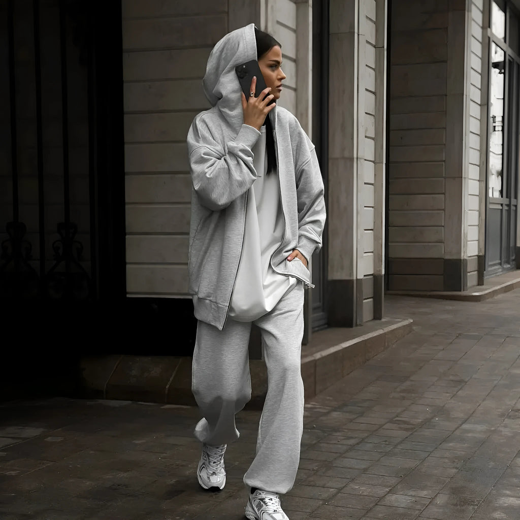 Women's loose fit street style two-piece set with long sleeve coat and trousers in solid colour