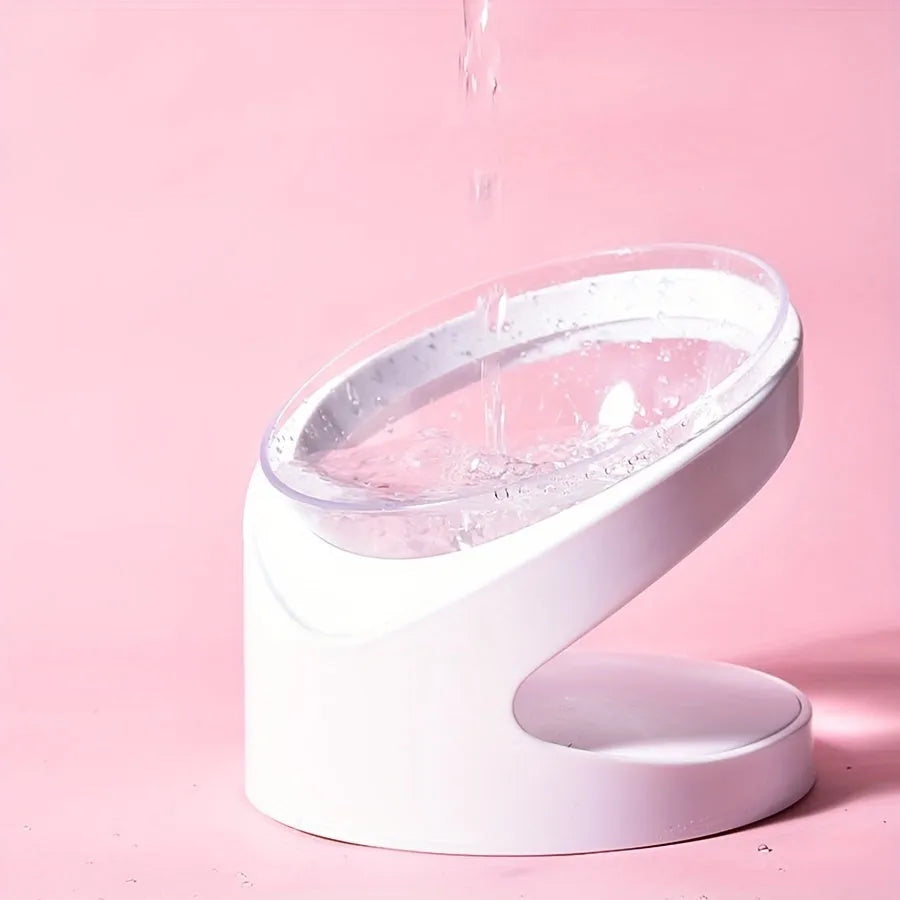 White plastic elevated cat food bowl with tilted design for neck protection