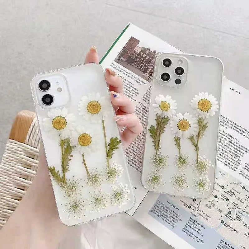 White epoxy daisy floral design TPU phone case for iPhone, showing back cover.