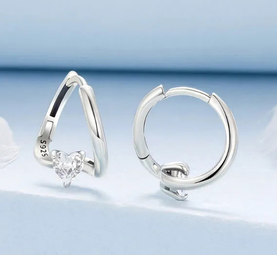 Heart shape love ear clip in 925 silver with polished finish and interwoven design for women