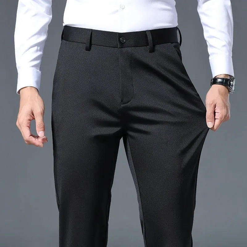 Men's slim fit stretch casual trousers in black polyester fiber with straight leg design and elastic waistband