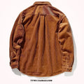 Man wearing a loose caramel corduroy shirt in Japanese Hong Kong style.