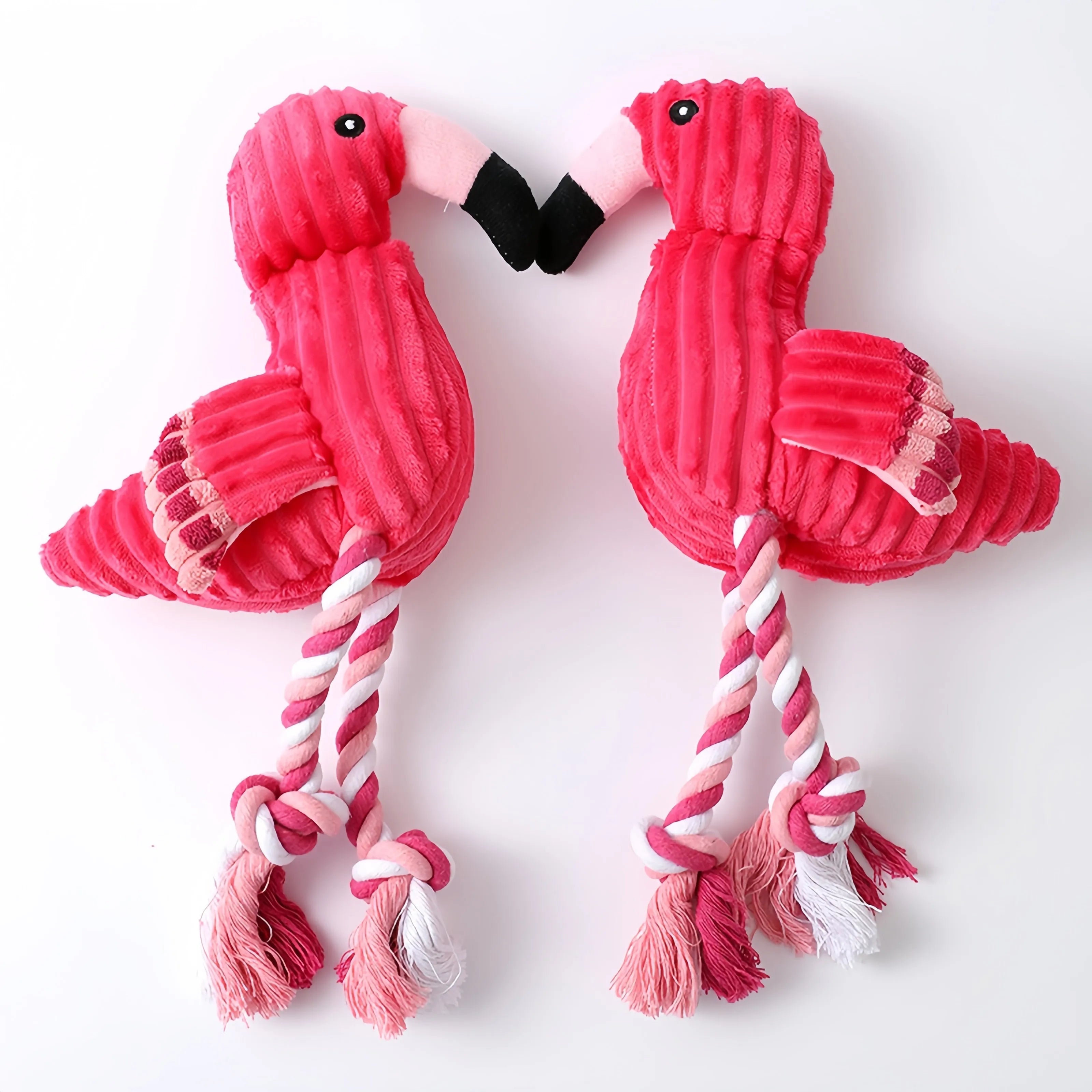 Pink corduroy animal-shaped plush dog toy with a squeaker inside
