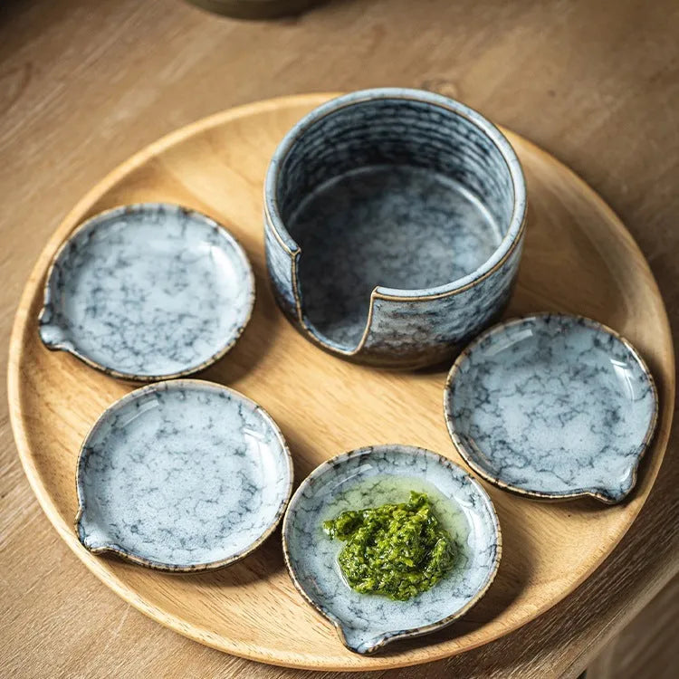 Japanese porcelain seasoning dish set with four plates and a storage tray in Aurora Green