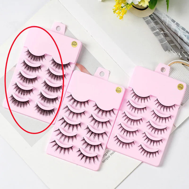 Five pairs of natural wispy manga false eyelashes in a tray, anime cosplay makeup style