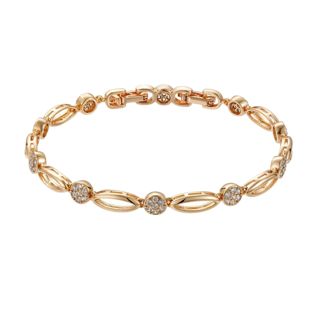 Golden hollow carved copper bracelet with U-shaped design on a wrist.