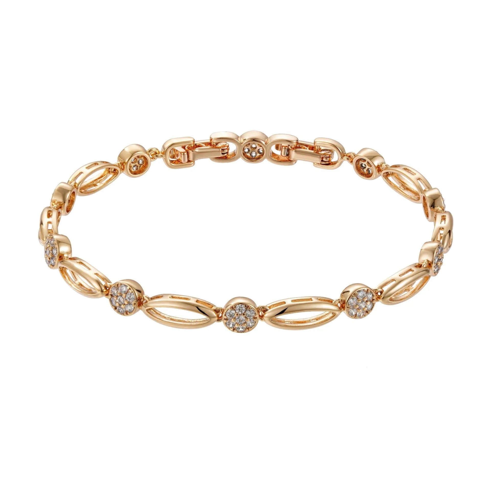 Golden hollow carved copper bracelet with U-shaped design on a wrist.