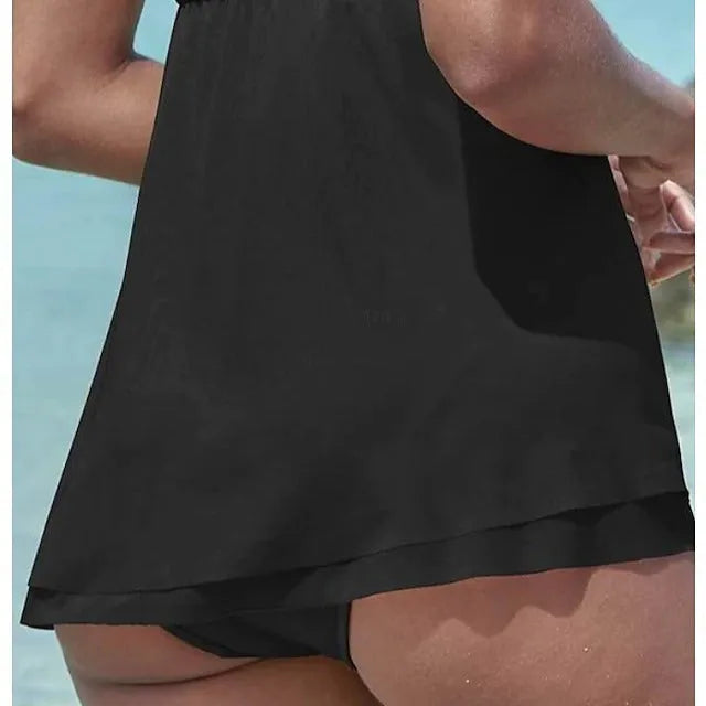 Women's solid colour strapless one-piece swimsuit on a hanger