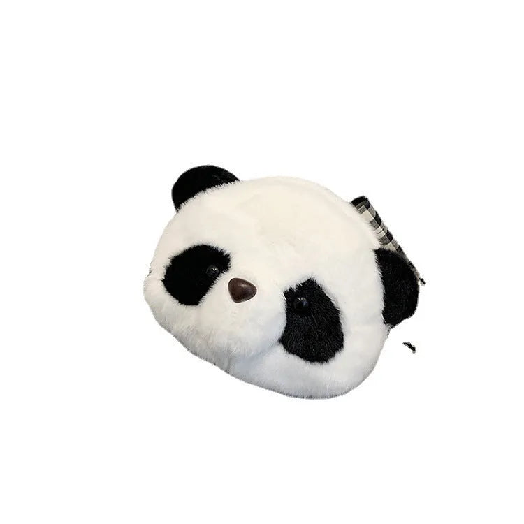 Soft plush crossbody bag in panda head colour with cylindrical shape and sandwich pocket.