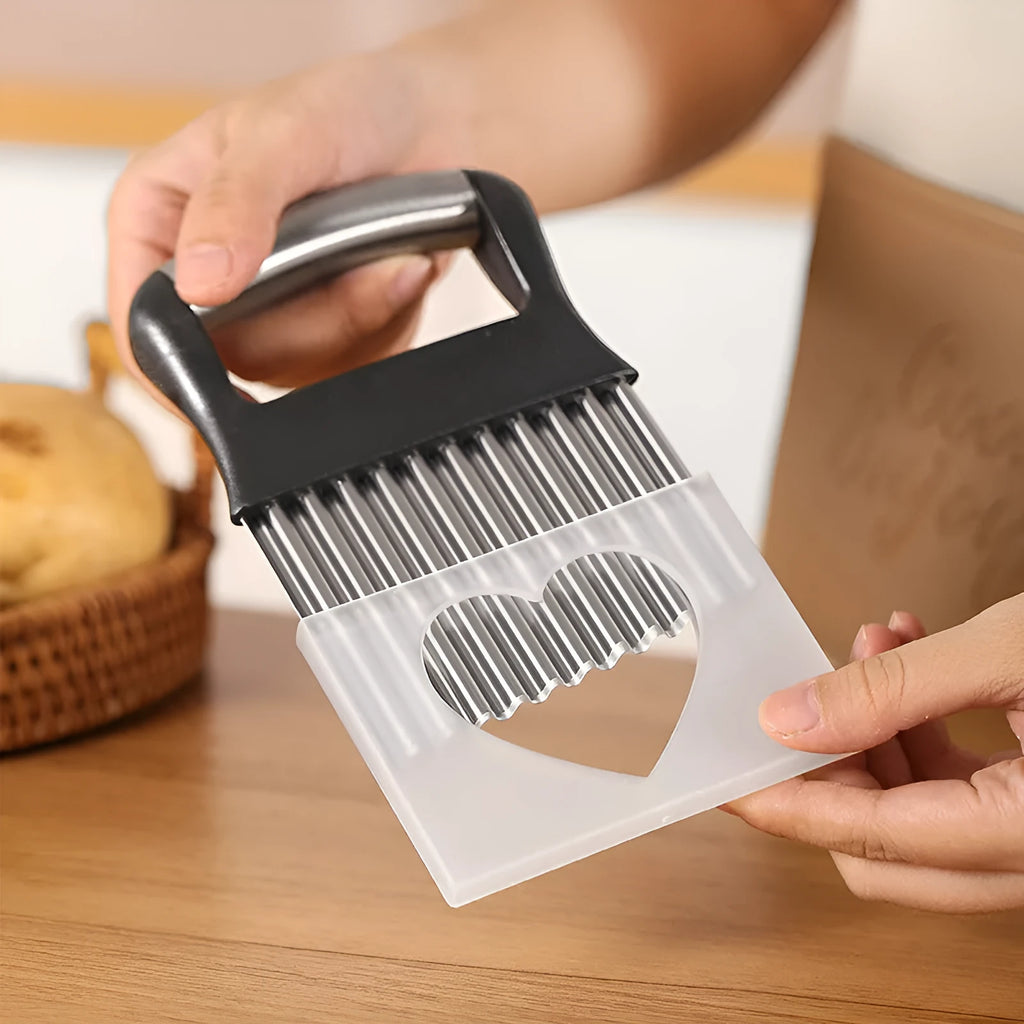Stainless steel potato wave knife with a 14cm wavy blade on a kitchen worktop