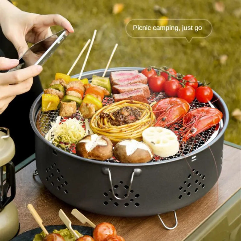 Portable stainless steel charcoal barbecue grill with detachable parts and storage bag for outdoor camping