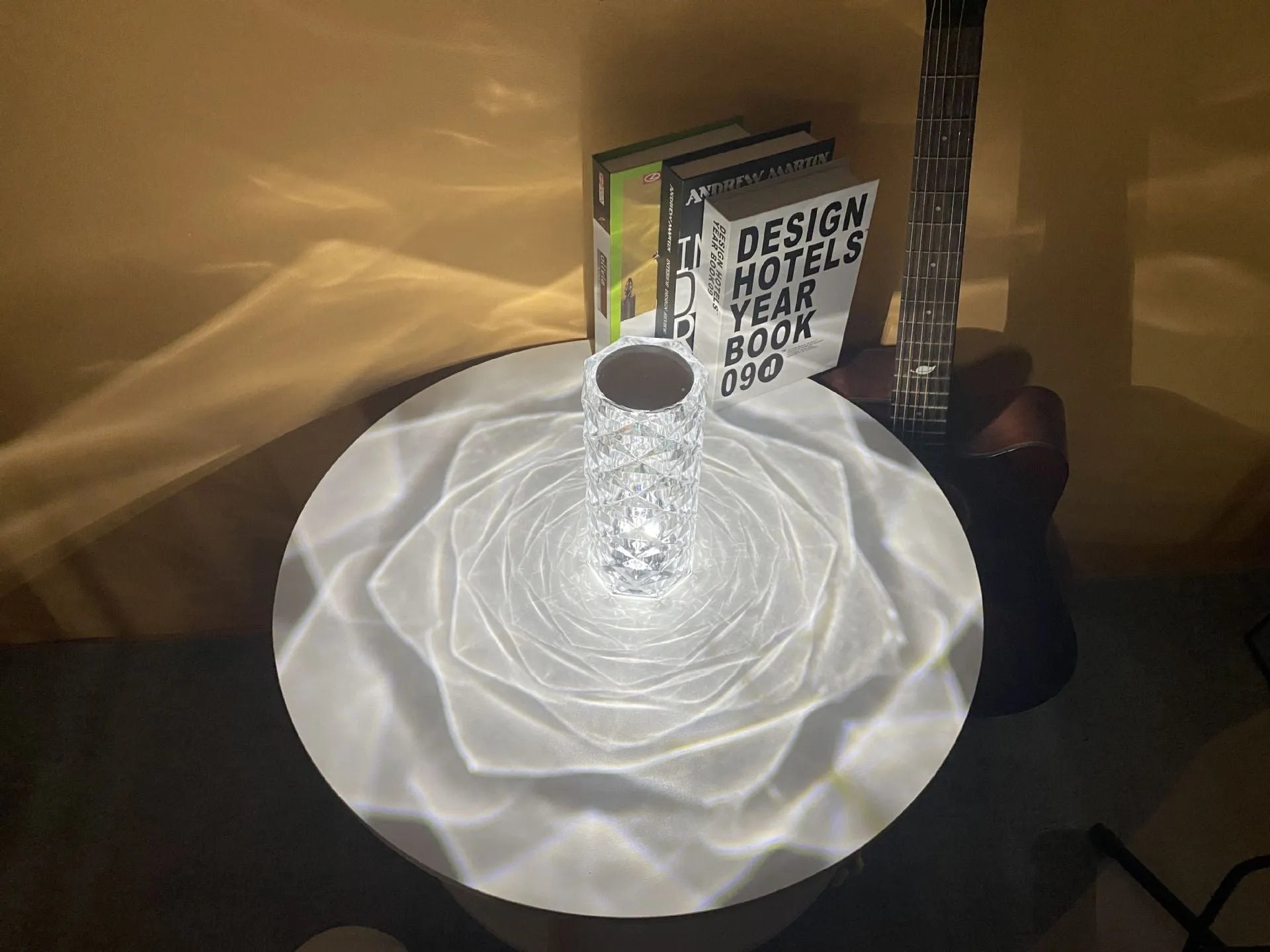 Romantic LED rose diamond table lamp with crystal-like PAMA acrylic construction on a table