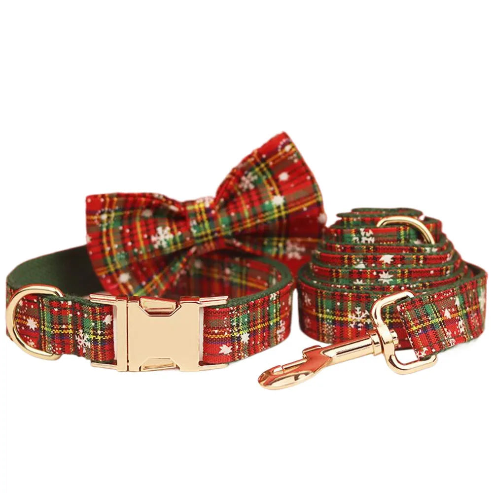 Green snowflake pattern pet collar set with matching dog vest, leash and decorative bow tie