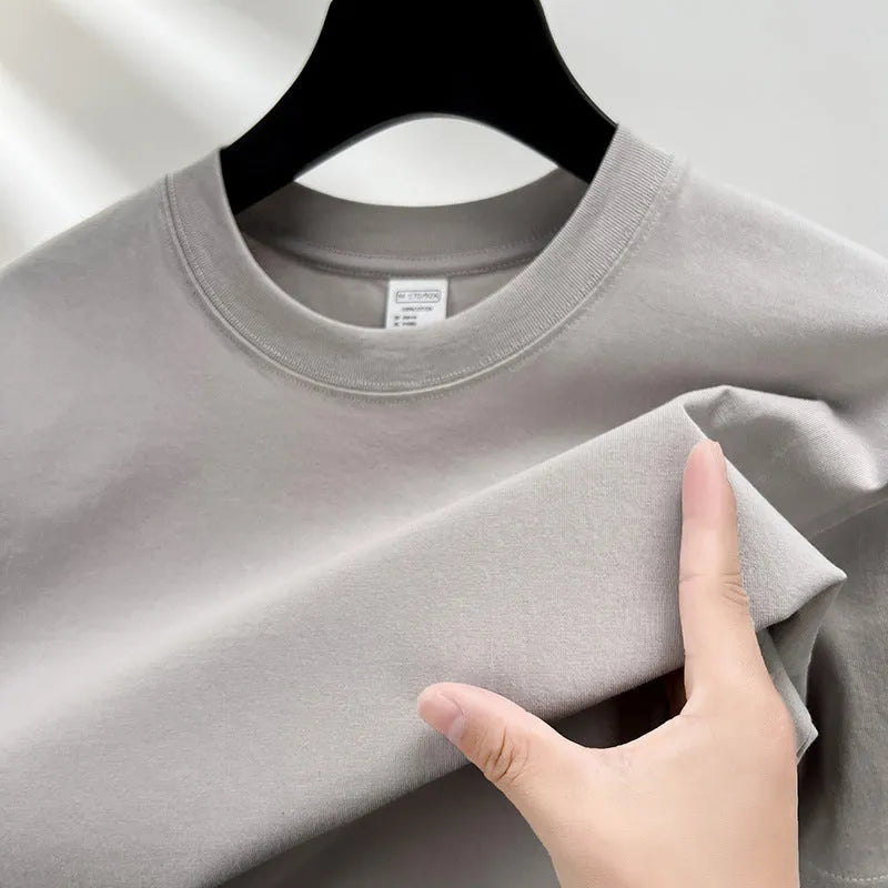 Men's thin cotton t-shirt with drop shoulder design in solid colour options like beige, sky blue, and pitaya