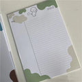 B5 sticky note paper pad with adhesive sheets in six colour variations including purple dog and orange