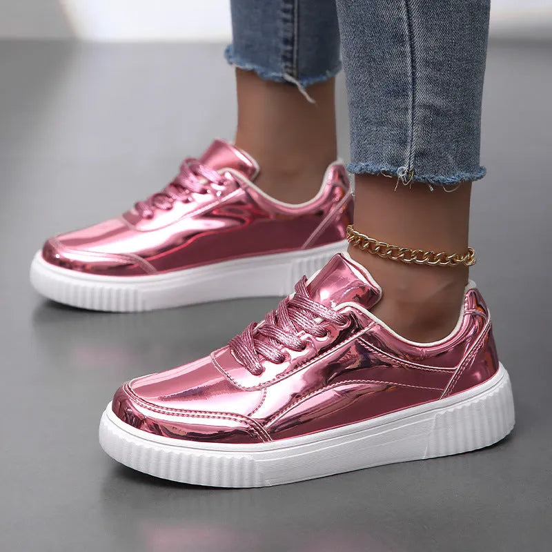 Gold sequin platform sneakers with a round toe and 3-5cm mid heel on a white background