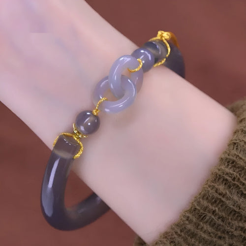 Smoke purple agate half bracelet with ring buckle closure on grey background