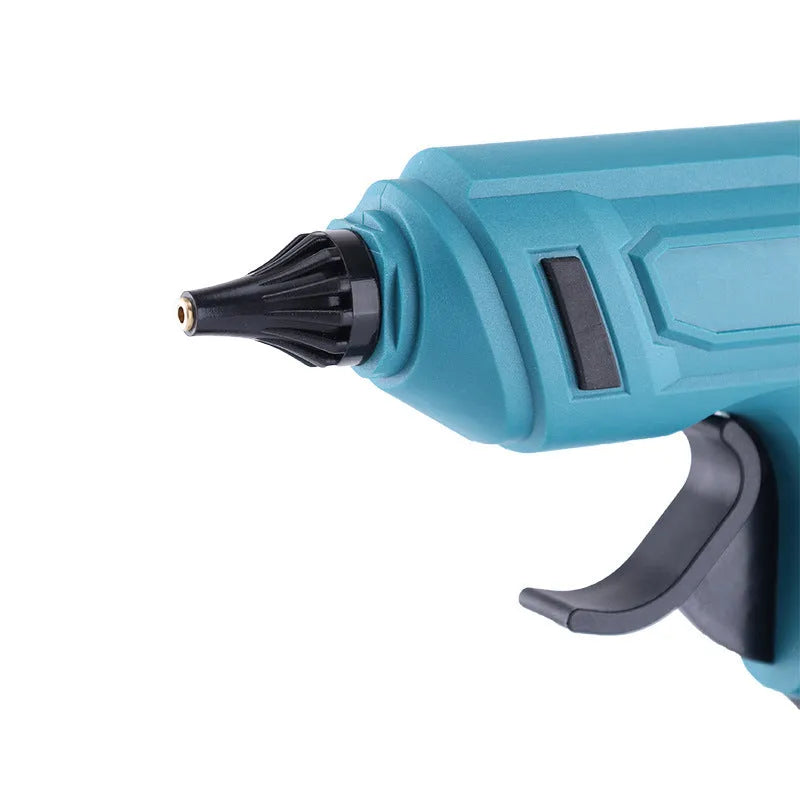 Handheld bare metal rechargeable hot melt glue gun with battery, charger, and glue sticks.