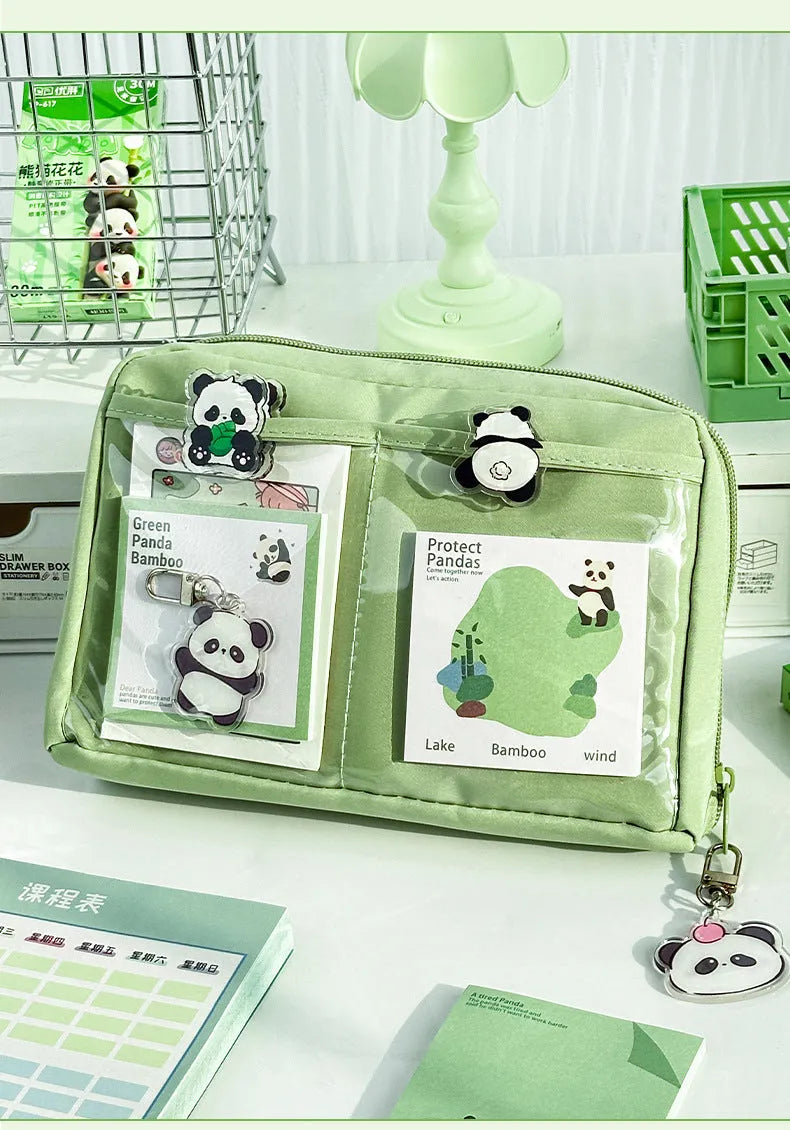 Green Korean-style canvas pencil case showing 12 open layers for organised pen and pencil storage