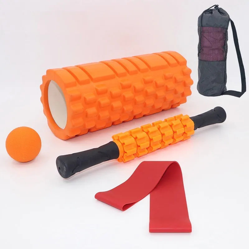 Black six-piece foam massage roller stick with gear design, 33cm long.