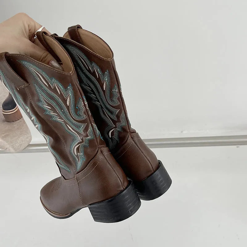 Brown women's embroidered Martin boots with mid-calf length, leather lining, and waterproof platform