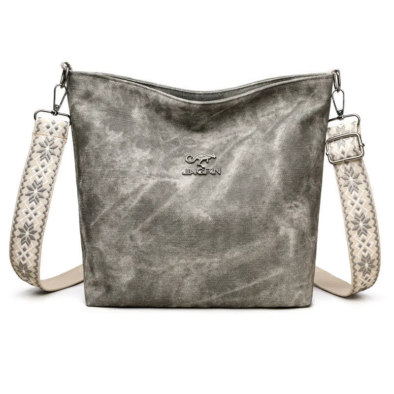 Soft PU leather crossbody shoulder bag in pink colour with large main compartment and single strap