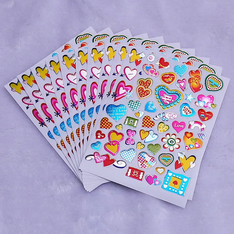 Pack of 100 waterproof gilding heart reward stickers with laser-cut edges on a backing sheet.