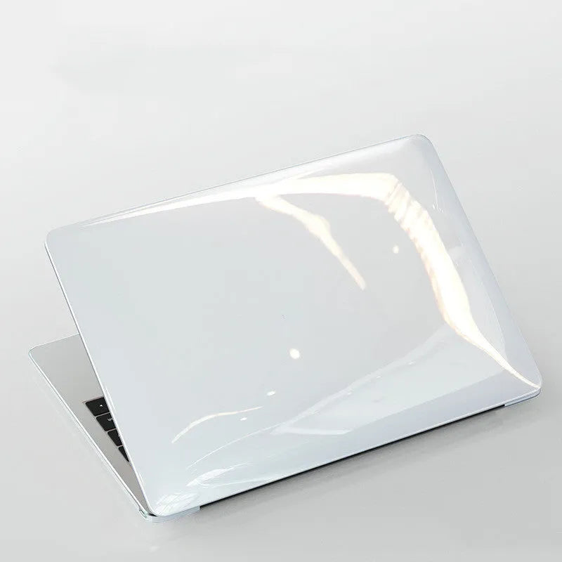 Transparent and black PC hard shell protective cases for Apple MacBook Pro 14-inch and 16-inch laptops.