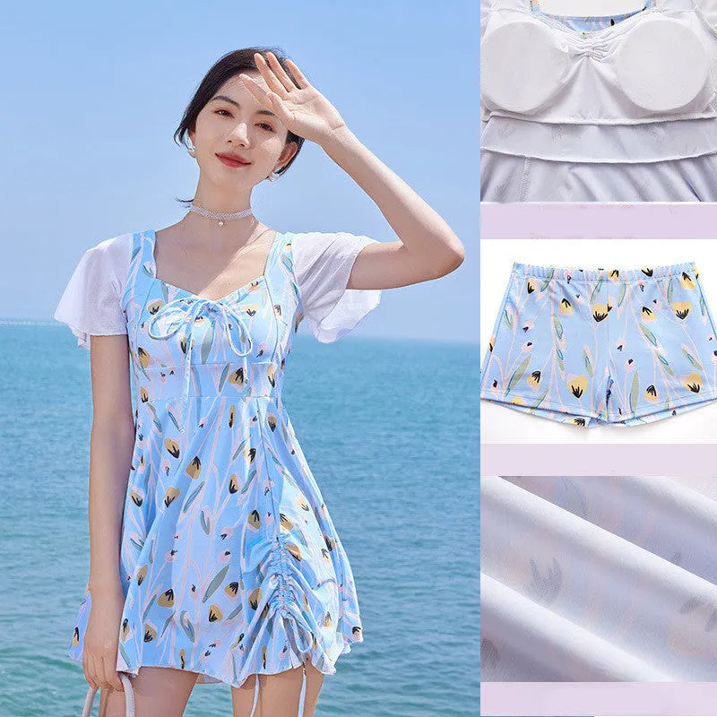 Sea salt blue floral pattern women's one-piece swimsuit on a hanger