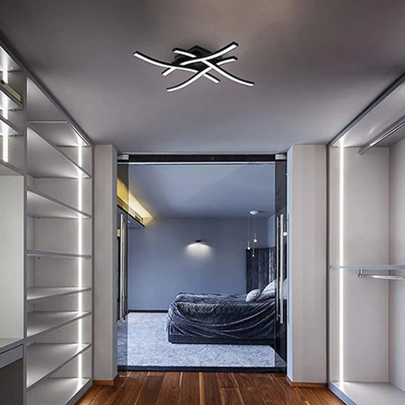 Modern minimalist black flush mount LED ceiling light with aluminium shade, shown on a white ceiling.