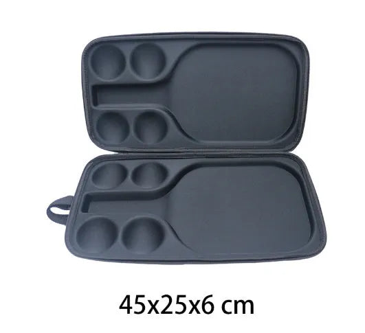 Black waterproof EVA pickleball bag with two shoulder straps, shown holding one paddle and four balls.