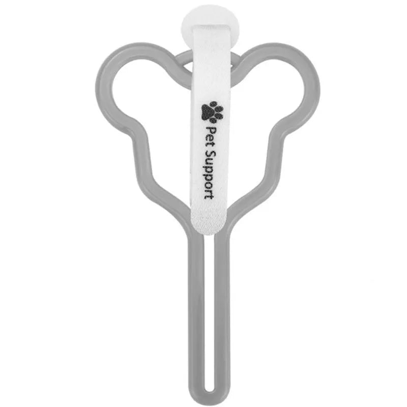 Dog poop bag holder with clip and velcro strap for leash attachment.