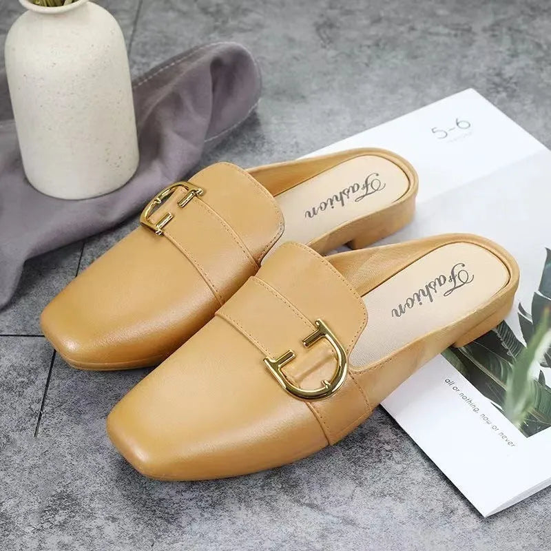 Women's PVC closed toe half slippers with buckle fastening in white, black and brown colours