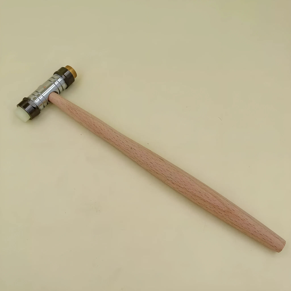 Brass hammer with wooden handle for watch repair and jewellery dismantlement