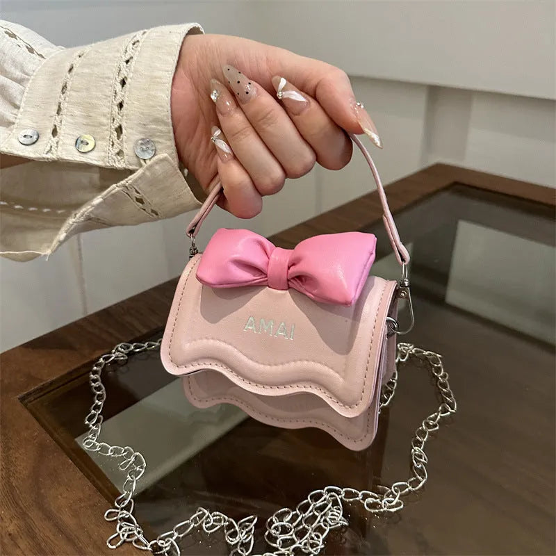 Mini PU crossbody handbag in multiple colours including black, pink, and silver