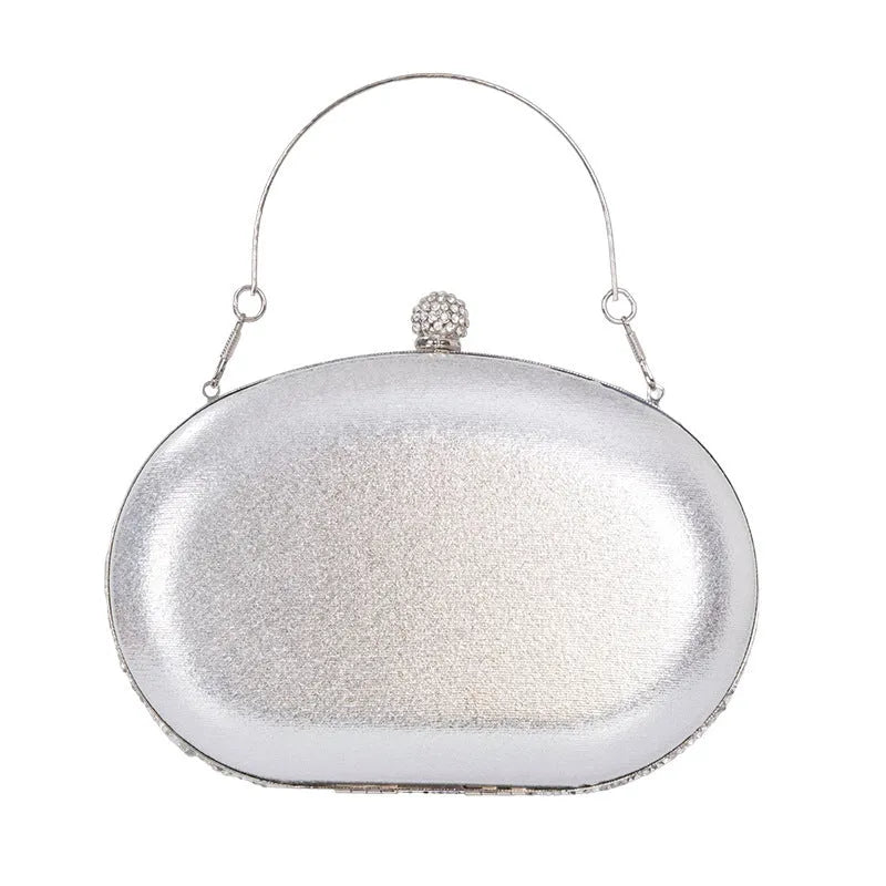 Gold hardware and rhinestone banquet handbag with structured retro design measuring 20cm wide