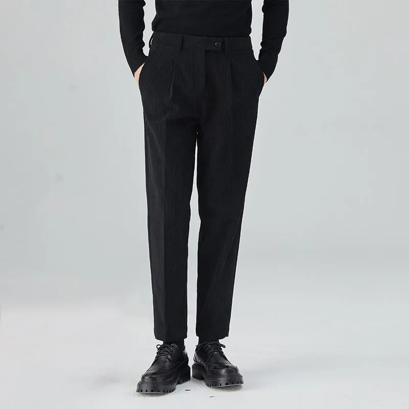 Men's straight-leg corduroy trousers in beige colour showing micro elastic waistband and loose fit design