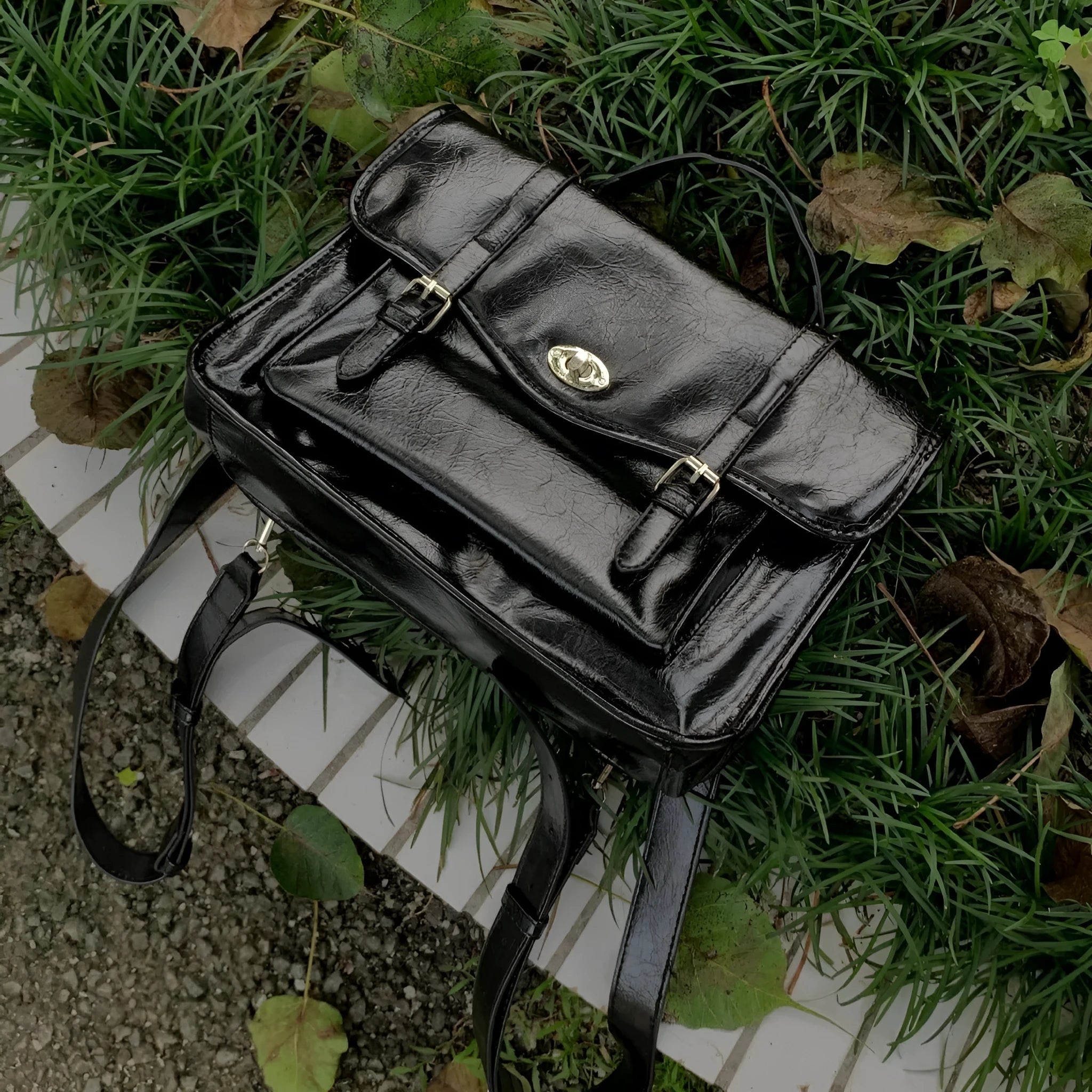 Black college style messenger bag with oil wax leather PU material showing dimensions 35x11x20cm