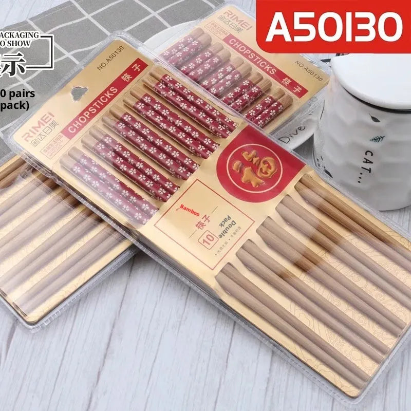 10 pairs of solid colour bamboo chopsticks on a plain surface, household kitchen use