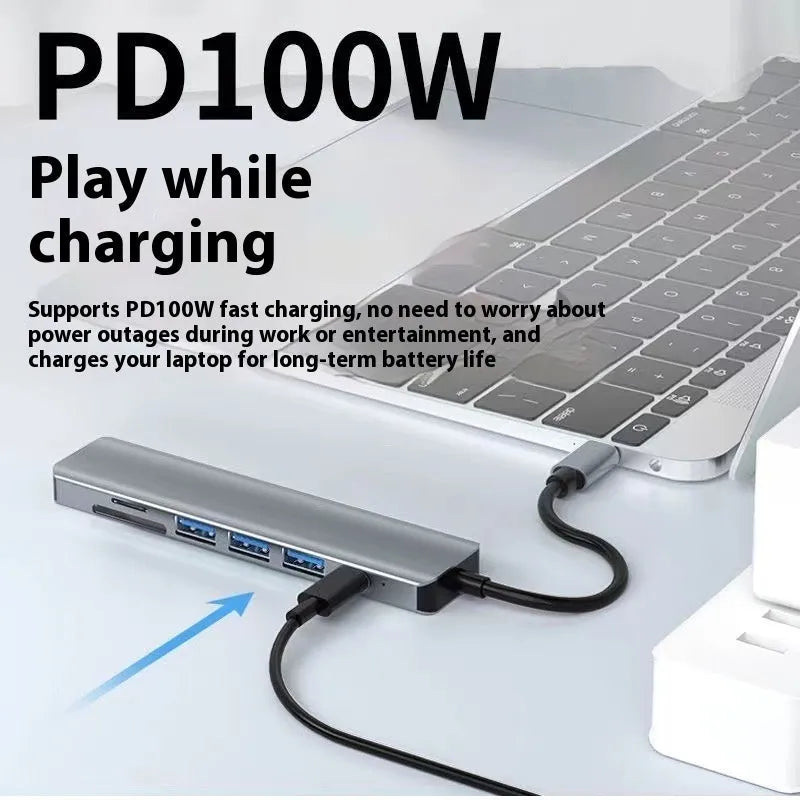 A USB-C 7-in-1 multi-function expansion dock hub with an attached 15cm cable.