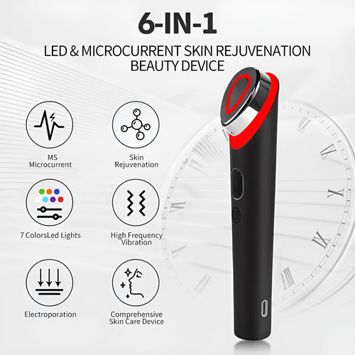 Black 7 colour light vibration eye and face massager on a dark background.