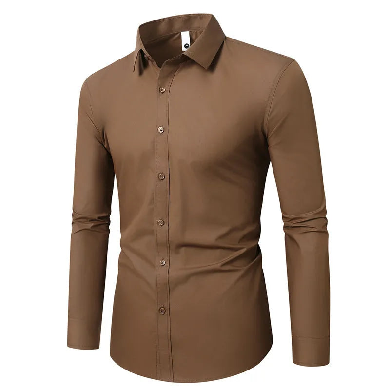 Man wearing a loose-fit linen long-sleeve shirt in a neutral colour, showing the casual style.