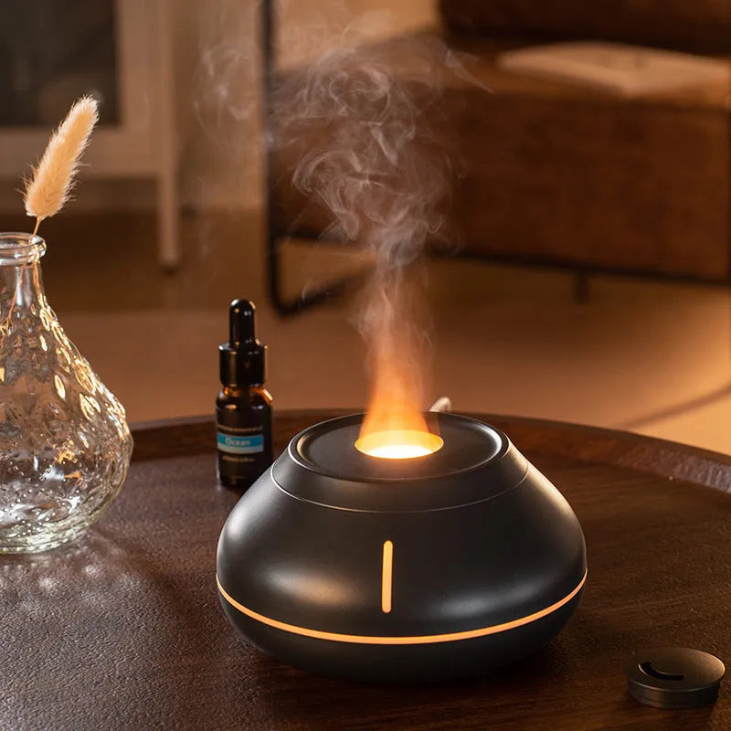 Round desktop humidifier with colourful flame simulation effect and USB power connection
