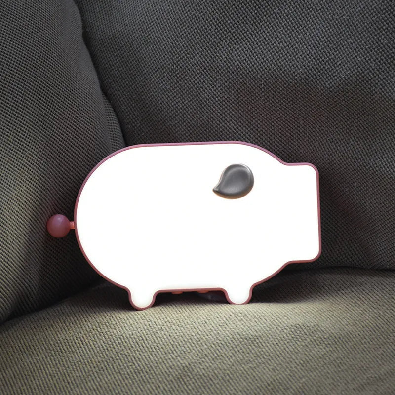 Blue multifunctional LED alarm clock showing time and temperature on display, with USB charging port.