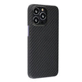 Dull black Kevlar fibre iPhone case with stripe detail and Magsafe magnet on a table.