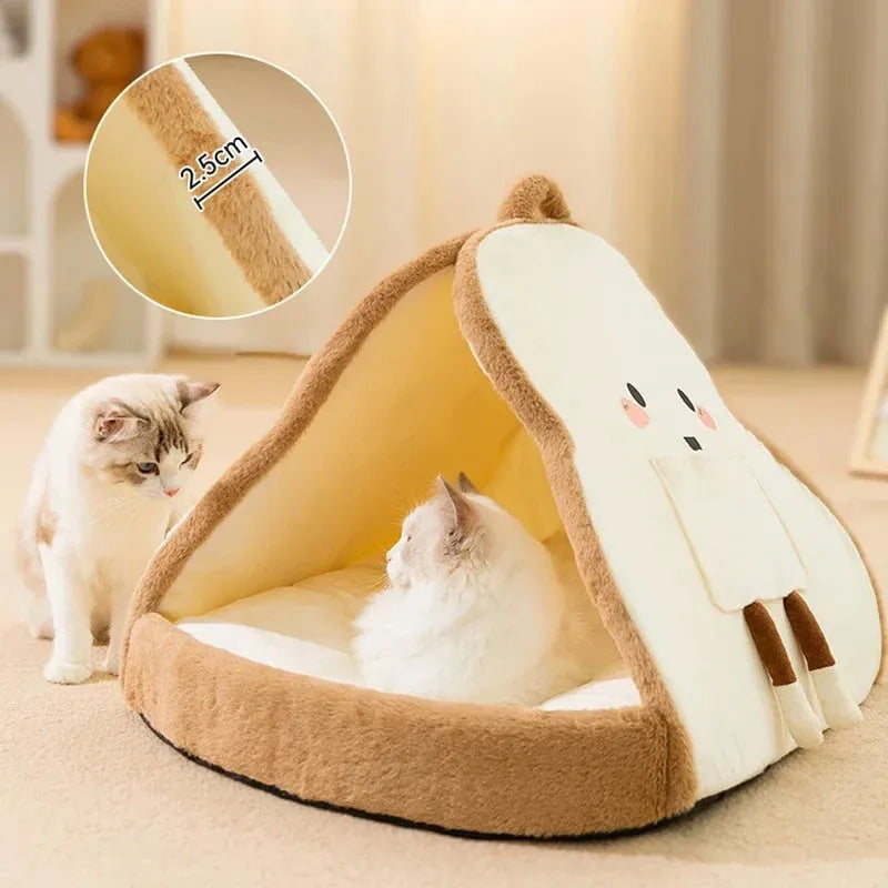 Green enclosed cat tent bed with removable blanket, shown in a large size for scale.