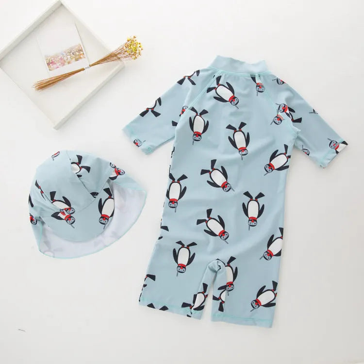 Boys' penguin print swimming costume set with long sleeves and matching swimming cap