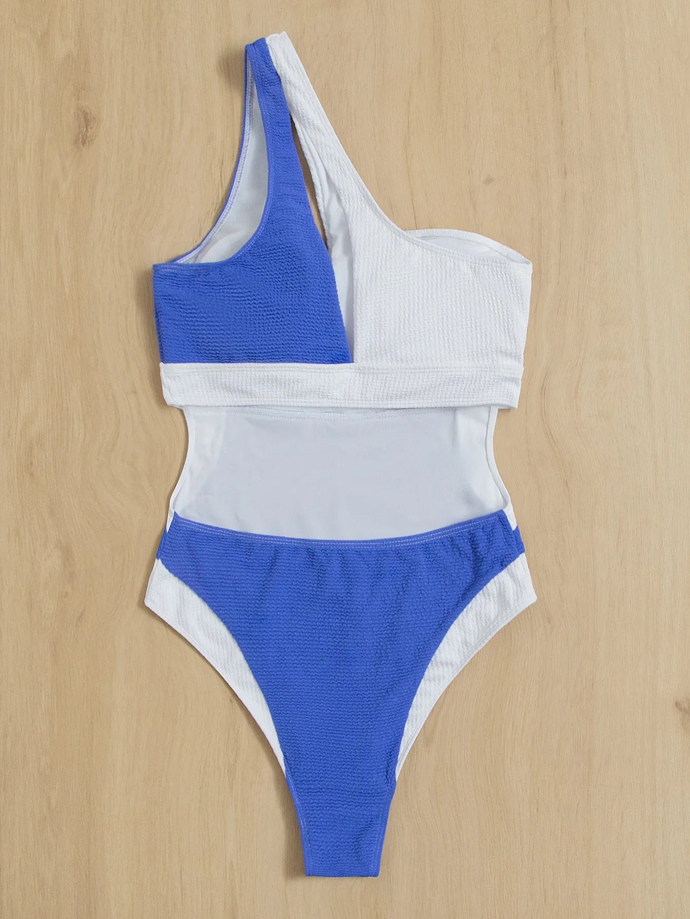 Women's one piece colorblock swimsuit in blue and white, front view, with chest pad and high elasticity fit