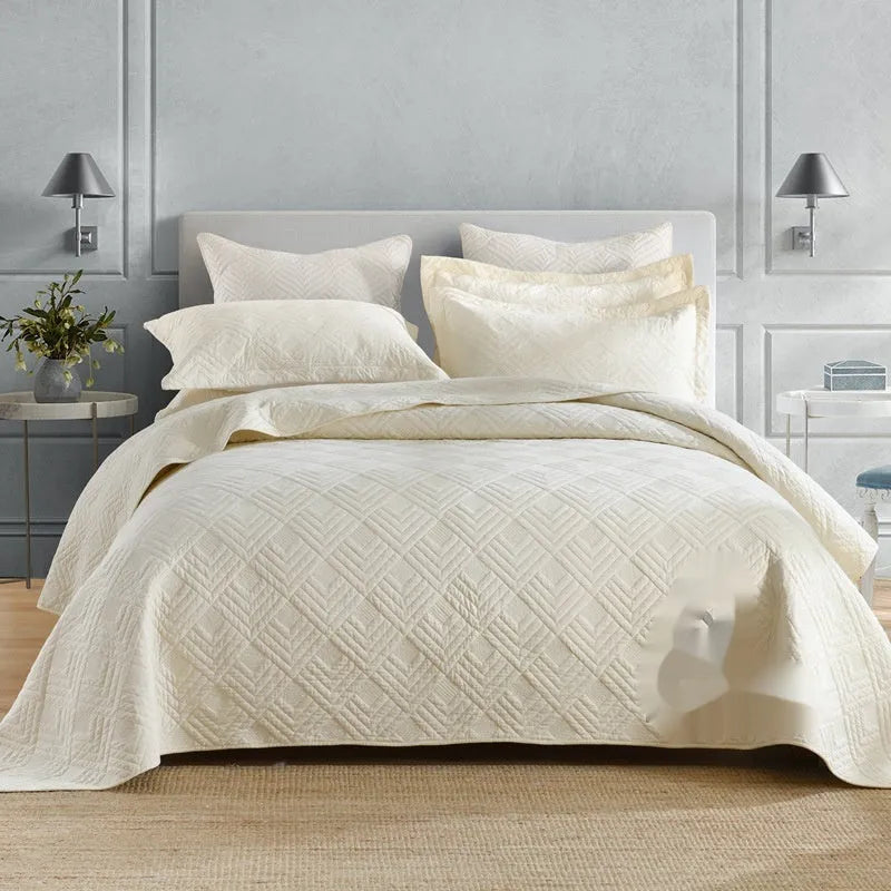 Double-sided pure cotton bed cover three-piece set in a light grey damascus pattern on a bed.